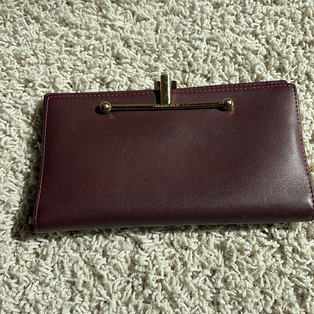 Strathberry wallet in maroon and pink
